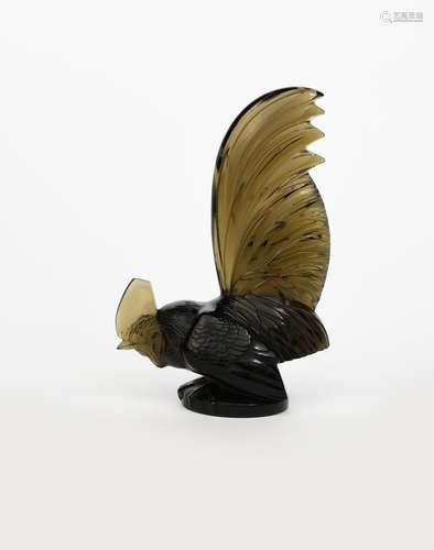 'Coq Nain' model no.1135 a Lalique Topaz glass car mascot designed by Rene Lalique, moulded R