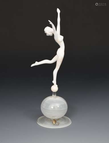 A glass figure of a woman by Istvan Komaromy, the white glass naked dancing figure, modelled