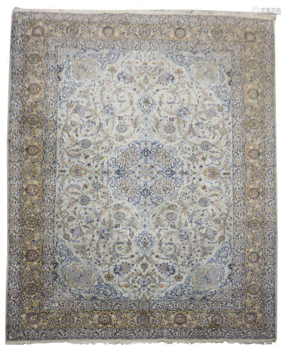 A PERSIAN NAIN CARPET CENTRAL PERSIA, 20TH CENTURY signed to top edge 409 x 307.5cm PROVENANCE