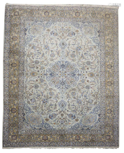 A PERSIAN NAIN CARPET CENTRAL PERSIA, 20TH CENTURY signed to top edge 409 x 307.5cm PROVENANCE