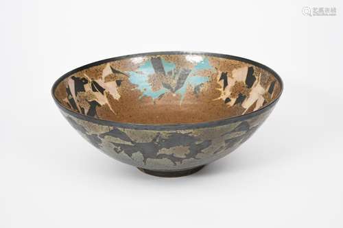 ‡ Sutton Taylor (born 1943) a large earthenware flaring bowl, on narrow foot, decorated with a