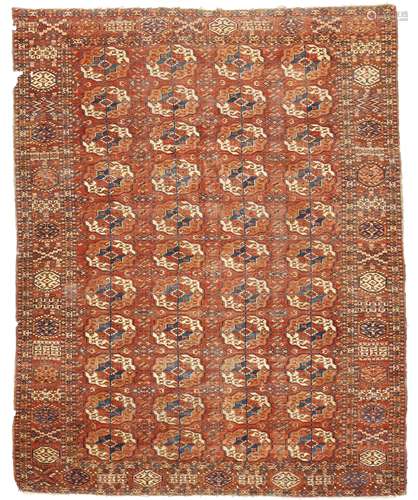 A TEKKE TURKMEN RUG TURKMENISTAN, SECOND HALF 19TH CENTURY four by eleven guls 231.5 x 188cm