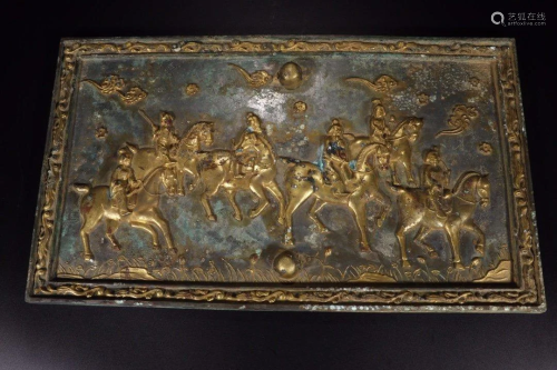 A GILT BRONZE RELIEF CARVING 'HUNTING FIGURE'…