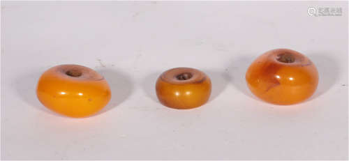 Three beads of Amber