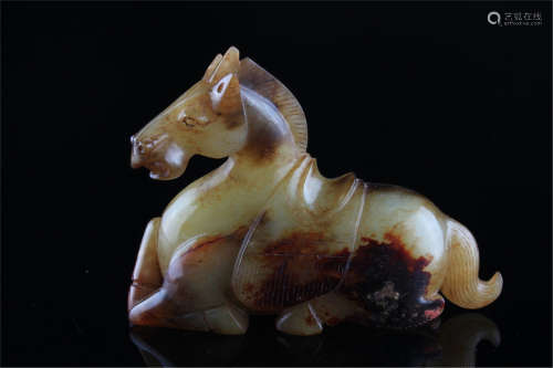 A Celadon and Russet Jade Horse