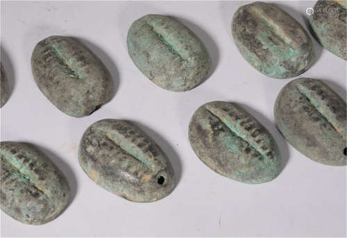 A Group of Bronze Shell coins