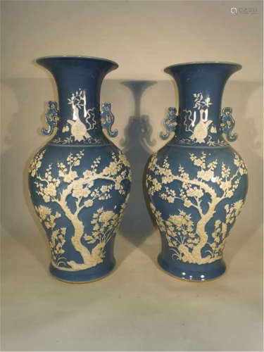 Pair of Blue Ground White Paste Vases of Qing Dynasty