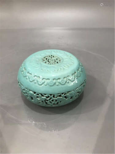 A Turquoise Green Glazed Paper Weight