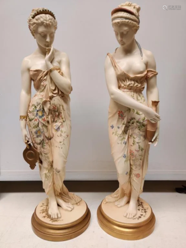 Pair of Tall Porcelain Statues