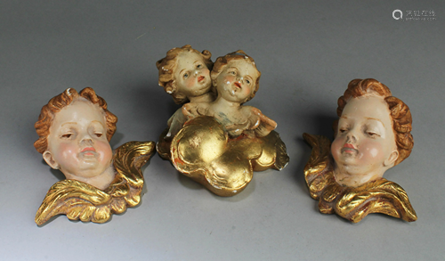 A Group Of Three Pottery Ornaments