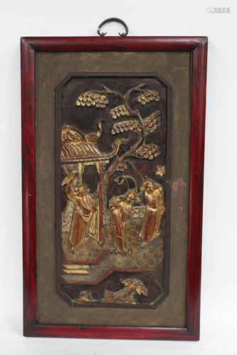 A Framed Carved Wooden Plaque