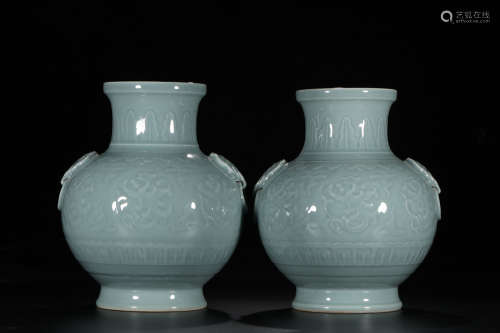 A Pair of Chinese Celadon Glazed Porcelain Zun