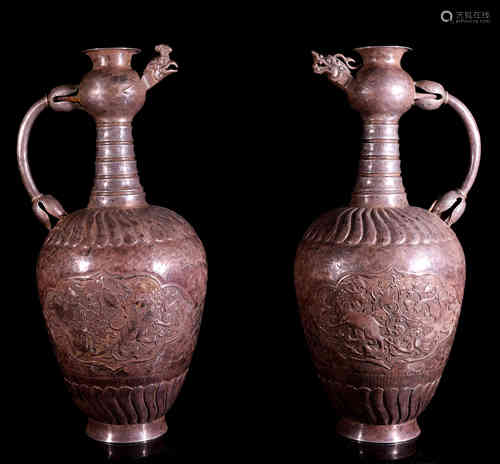 A Pair of Chinese Silver Dragon Mouthed Pots