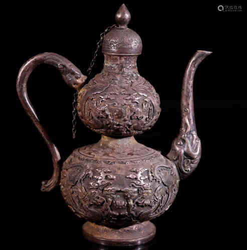 A Chinese Carved Silver Wine Ewer