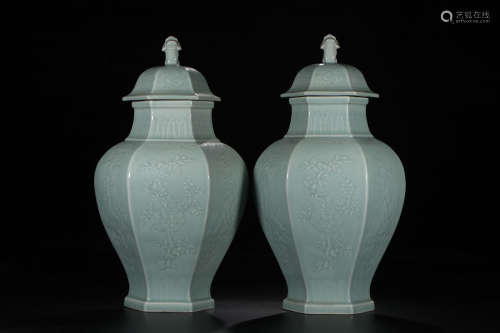 A Pair of Chinese Celadon Glazed Floral Porcelain Hat-coverd Jars