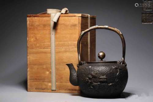 A Japanese Iron Hoop-handled Kettle