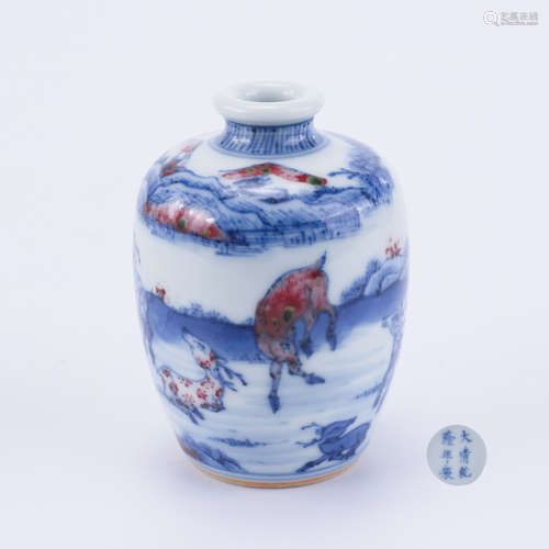 An Under Glaze Blue and Copper Red Snuff Bottle