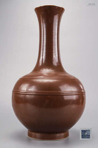 An Aubergine Glazed Bottle Vase