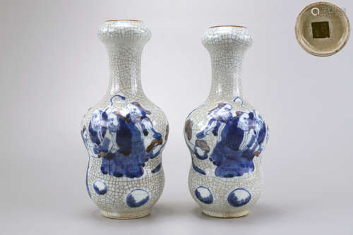 Matched Pair Blue and White Figures Vases