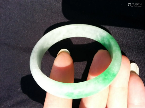 China Jadeite bangle. Diameter 2 3/4 in.