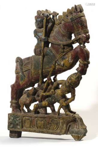 INDIA Sculpture from a house frieze or a ceremonial carriage in polychrome carved wood representing a double horseman riding on figures from the Indian pantheon. Popular art from the end of the 19th century Height: 57 cm