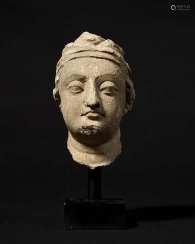 Head carved in stone Gandhara Style Height: 15 cm