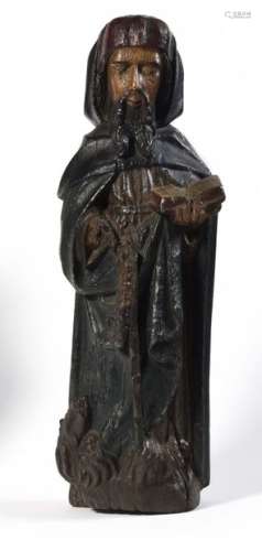 Saint Antoine in wood carved in the round and polychromed 15th century Height: 58.5 cm (vermilion and missing parts, polychromed)