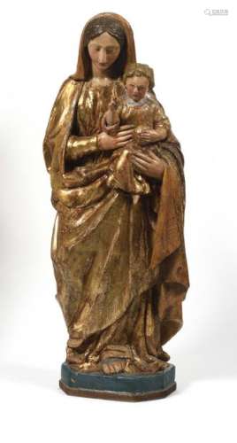 Virgin and Child in wood carved in the round, polychrome and gilded, gabled terrace. Italy, 16th century Height : 105 cm (some lacks in the gilding)
