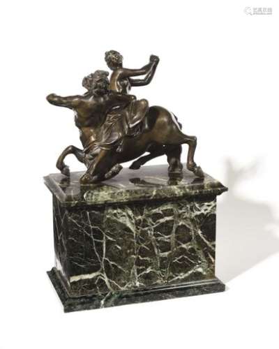 Bronze group with brown patina representing Nessus and Déjanire, on a sea-green marble base. 19th century (missing). H (total) : 36 cm, W : 25 cm, D : 14,5 cm