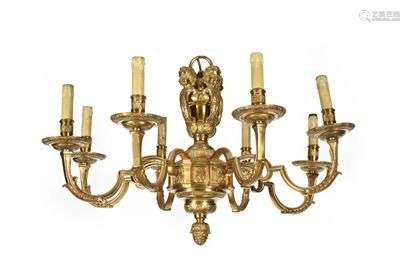 Eight-branched gilt bronze chandelier decorated with foliage scrolls, surmounted by busts of children and finished with a pine cone, (electrically mounted). Louis XIV taste, end of the XIXth century. H : 50 cm, W : 81 cm