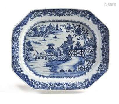 China Rectangular porcelain dish with blue monochrome decoration of a lake landscape with pagodas, flowered braid on the edge. 18th century, Qianlong period (1736-1795). 45 cm x 38 cm