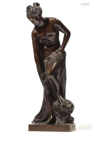 Bronze figure with brown patina representing a bather after Christophe Gabriel Allegrain , inscribed Allegrain (on the base). Second half of the XIXth century. H: 27 cm This bronze was made after the famous Bather of Christophe Gabriel Allegrain (1710-1795) mentioned in the 1767 livret du salon as visible in the sculptor's studio (G. Scherf, L'Antiquité rêvée, cat. Exp., Musée du Louvre, Paris, 2010, p.99-101). Denis Diderot took a passion for this sculpture and wrote: 