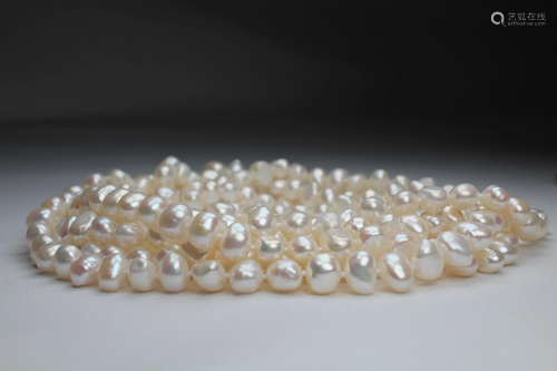 Unusual 100 inch Strand of White Freshwater Pearls