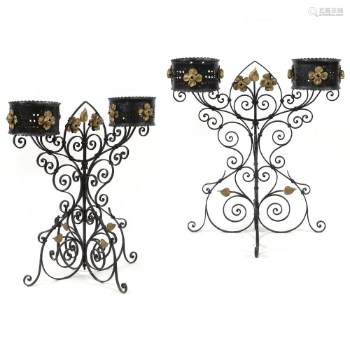 A pair of wrought iron jardinieres 19th century