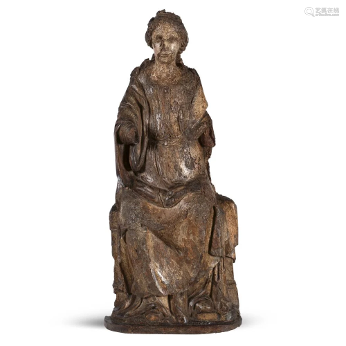 Wooden sculpture depicting the Madonna on th…