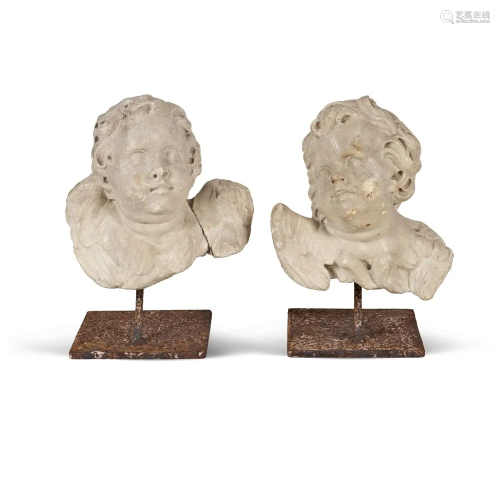 Two white marble putti heads Genoa, 18th century