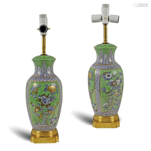 A pair of porcelain lamps 20th century h. 70 cm.
