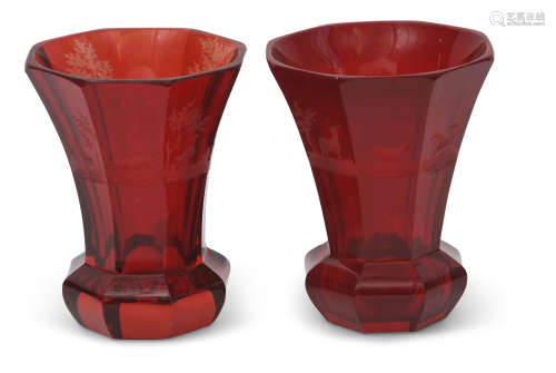 Pair of Bohemian ruby red vases of octagonal shape, the vases engraved with various hunting subjects