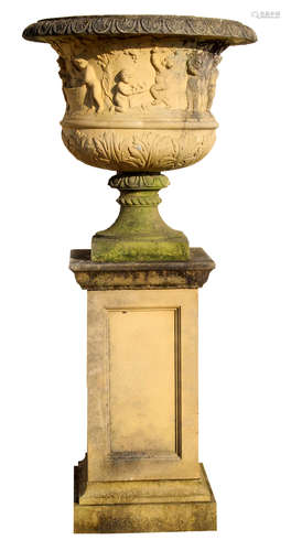 Good quality large reconstituted stone garden urn and stand with urn with raised relief design of