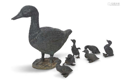 Good quality patinated free-standing bronze duck with six ducklings in varying poses (unsigned),