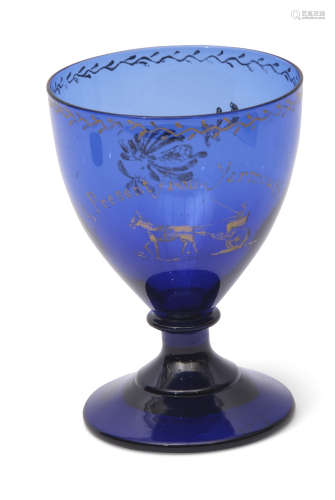 Absolon decorated blue glass rummer, ovoid bowl with gilt decoration to the front 