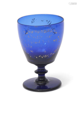 Absolon decorated blue glass rummer with bucket shaped bowl above knopped stem, the bowl