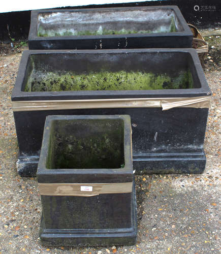 Pair of modern black painted garden planters of rectangular form on stepped bases, 74cm wide,