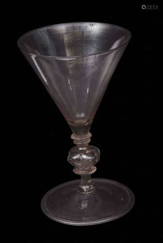 Late 17th century Anglo-Venetian or possibly Anglo-Dutch soda glass, the wide funnel bowl above a