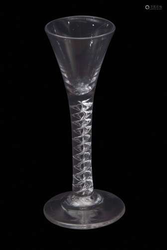 Mid-18th century tall mercury twist wine or cordial glass, the drawn trumpet bowl above plain
