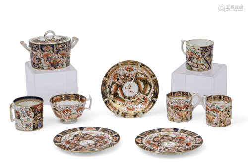 Group of Derby wares including two 19th century Derby coffee cans with typical Imari decoration, a