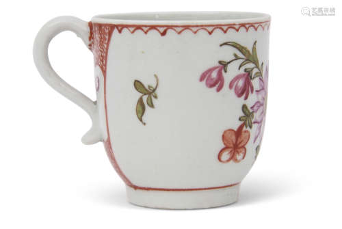 18th century Lowestoft porcelain coffee cup with a polychrome floral design and a panel verso with