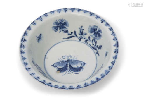 Large 18th century Lowestoft porcelain patti-pan decorated in underglaze blue with trailing flowers,