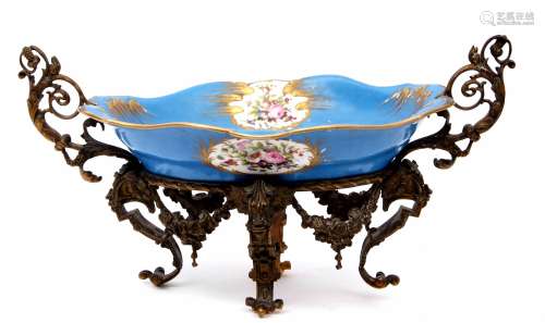 19th century Sevres style centrepiece, the porcelain bowl supported in a gilt scrolling frame, the
