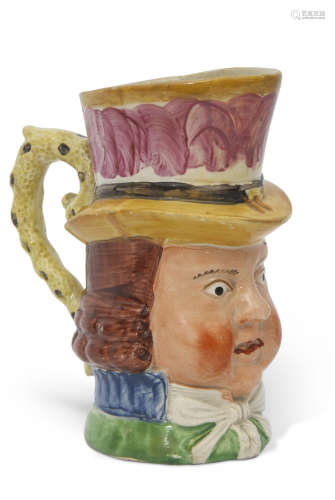 Staffordshire Toby Jug with polychrome decoration, possibly of Paul Pry, 14cm high